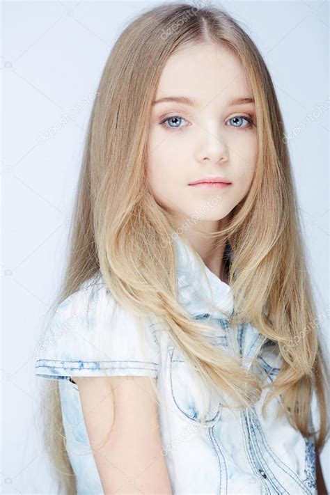 Portrait Of Young Blond Girl Stock Photo By ©fxquadro 87313336