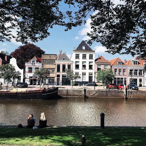 Preise vergleichen, günstiger buchen und bis zu 80% sparen. Zwolle Netherlands in the summer. two friends chit ...