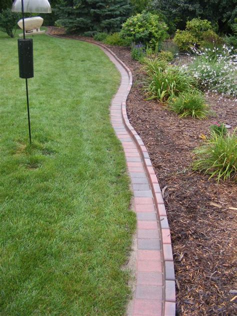 Pin By Krista Milligan On Backyard Brick Garden Brick Garden Edging