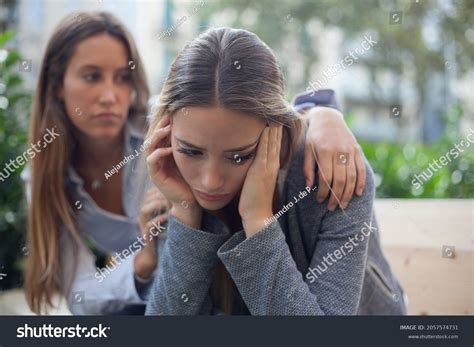 Woman Comforting Hugging Depressed Friend Concept Stock Photo