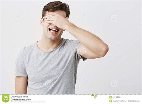 Shocked Stressed Emotional Young Man Hiding His Face Behind His Hand