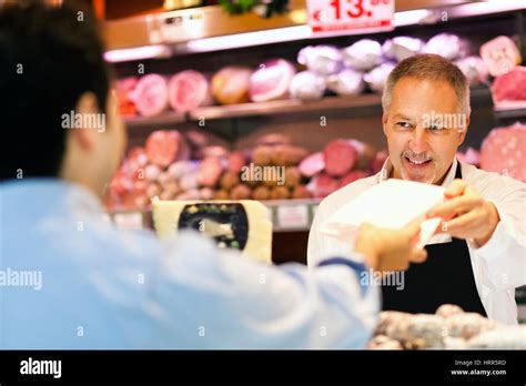 Shopkeeper Serving A Customer Hi Res Stock Photography And Images Alamy