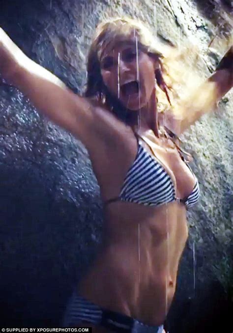 Heidi Klum Shows Off Her Slender Midriff In A Sailor Inspired Bikini