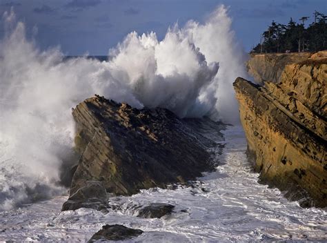 Massive Wave Explodes Against The Cliffs At Oregons Shore Acres State