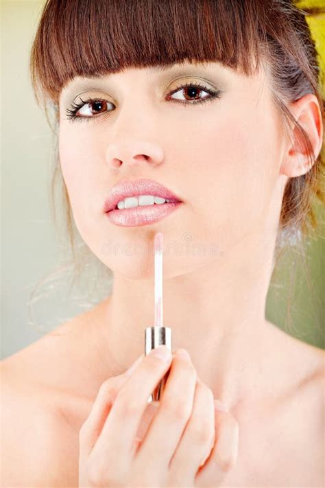 Woman Putting Lipstick On Her Lips Royalty Free Stock Image Image 29384706