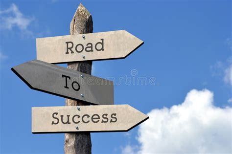 Road To Success Wooden Signpost With Three Arrows Stock Photo Image
