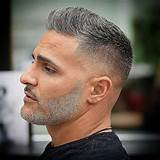 Short comb over men's haircut with strong side part. #barbershophaircuts | Grey hair men, Mens haircuts short ...