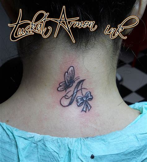 Lettering Butterfly Tattoo