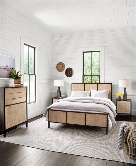 A woven cane bedhead is the hero piece of this relaxing bedroom space. Loving the cane furniture trend? Shop it now from # ...