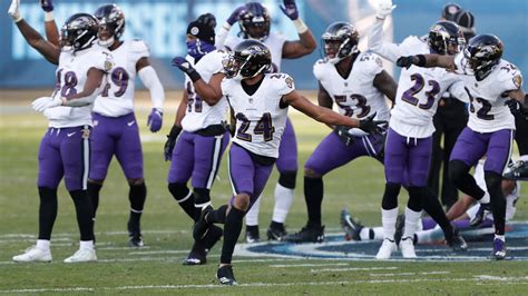 Ravens Defense Celebrates Playoff Win By Dancing Stomping Titans Logo