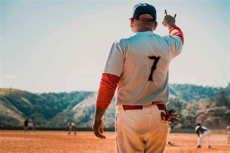 why do baseball coaches wear uniforms rookie mentor