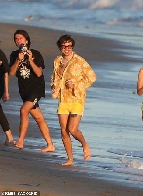 Harry Styles Chased By Models On Malibu Beach
