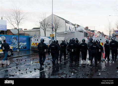 Belfast Uk 120113 Riot Police Charging Loyalist Youths As Rioting