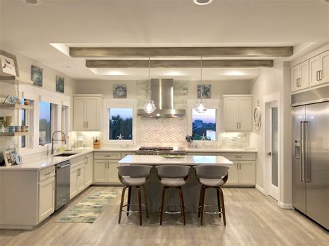 You may prefer to create immediate views from the dining and seating areas instead, though, in which case the kitchen can be located further back. My Coastal Dream Kitchen | Kitchen layout, Dream kitchen ...