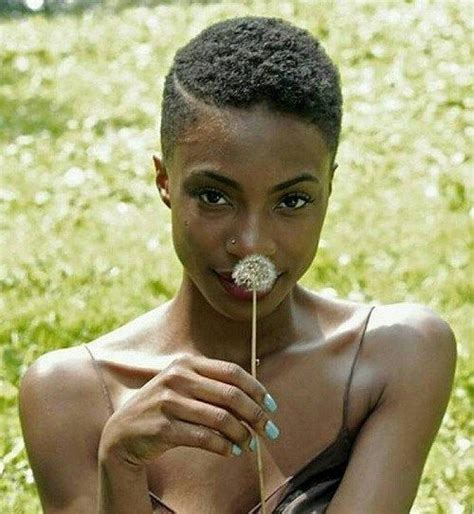 Women S Short Afro With A Shaven Side Part Cute Short Natural Hairstyles Natural Hair Short