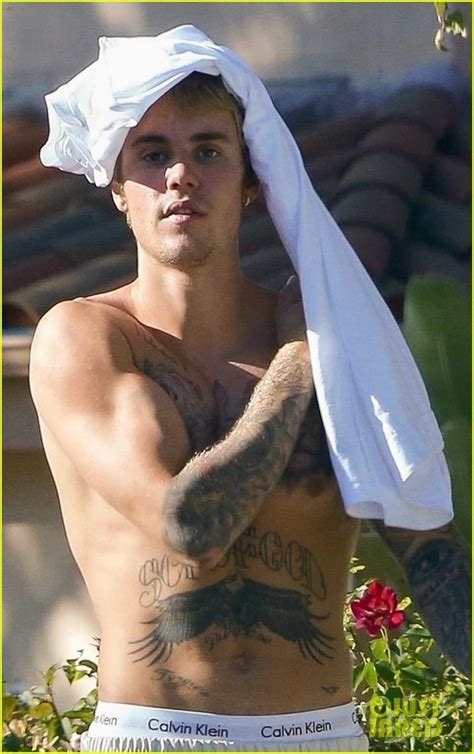 shirtless justin bieber shows off bulging biceps and toned abs photo 3966378 justin bieber