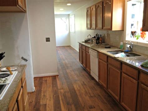 They like the idea of matching the. Rustic Vinyl Floor Coloring That Goes With Golden Oak Wood Kitchen Cabinets - Modern House