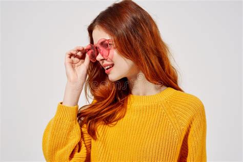 Pretty Woman In A Sweater And Glasses Hairstyle Fashion Glasses Posing