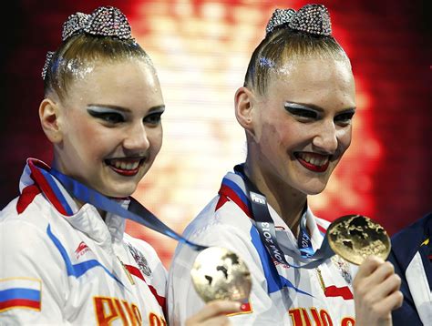 — синхронистки светлана ромашина и светлана колесниченко выиграли золото олимпийских игр в дуэте. Золотые Ромашина и Колесниченко