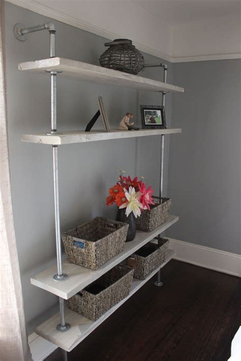 I had rust stains on kitchen towels that nothing would remove, then remembered my grandma's remedy. grey rustic DIY shelf made from metal plumbing pipes and ...