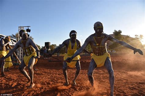 aboriginal australians dance in traditional dress at uluru daily mail online