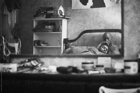 Black And White Portrait Of Gay Black Men Couple Lying In Bed By Stocksy Contributor Joselito