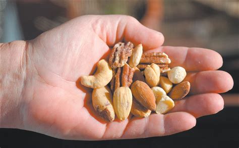 One serving — 28 grams or a small handful — packs roughly: What Are the Best Nuts to Eat? - Tufts Health & Nutrition Letter