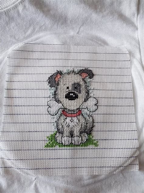 Learning how to cross stitch is easy, and these instructions for beginners will get you stitching in no time! How to Cross Stitch onto a Garment | Cross stitching ...
