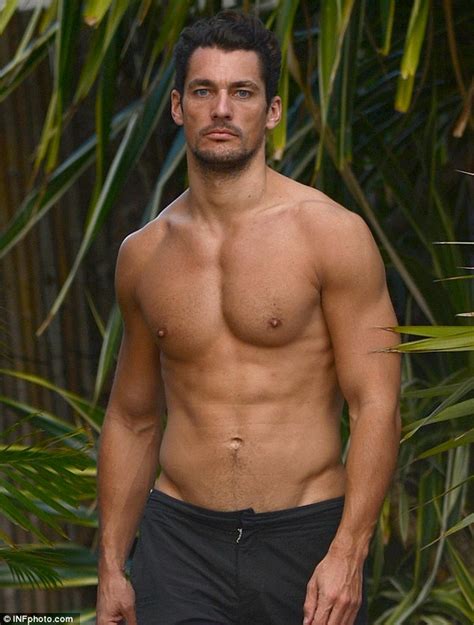 David Gandy Displays His Tanned And Toned Physique As He Goes Topless