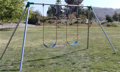 Playground swings are a staple of any play area. Jensen Swing Standard 10-Ft. High Residential Swing Set