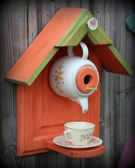 Teapot birdhouse from cabinet door. | Teapot birdhouse, Bird houses diy