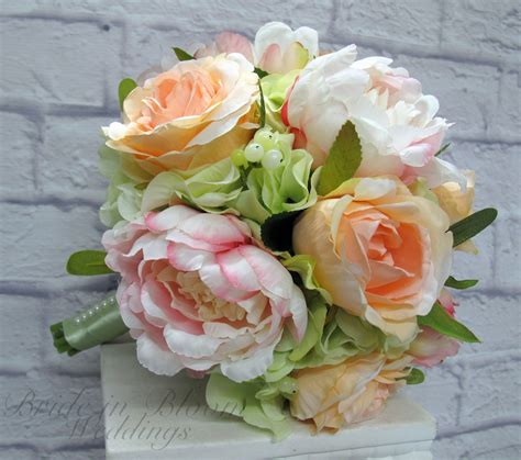 the romantic peony wedding bouquet peonies are known as the flower of riches and honor with