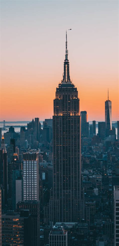 Download 1440x2960 wallpaper empire state building, buildings, sunset