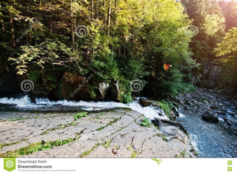 Fast Mountain River With Waterfall At Suset On Carpathian Mountains