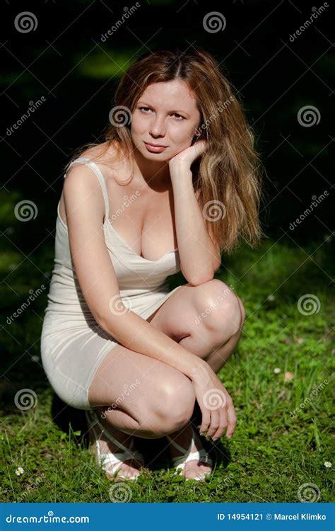 Crouching Woman At The Park Stock Image Image 14954121