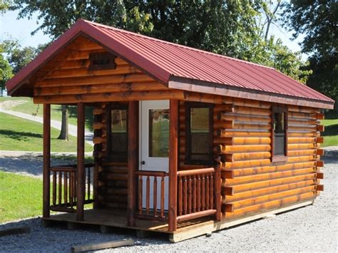 Bought building 1 year ago still good an strong with all the amarillo wind metal roof the best Portable Log Cabin Kits Basic Log Cabin Kits, hunter cabin ...