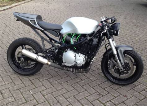 Suzuki katana street fighter (page 1) turned a free suzuki katana 600 into a street fighter last night. Suzuki GSX-750F caferacer | Cafe racer, Bmw cafe racer ...