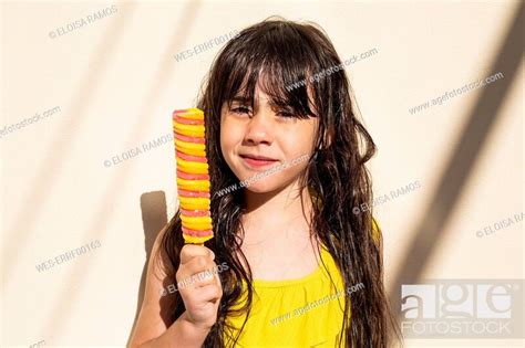 Portrait Of Little Girl With Popsicle Stock Photo Picture And Royalty