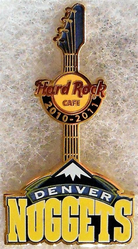 The denver nuggets logo is one of the nba logos and is an example of the sports industry logo from united states. NBA Logo Guitar - Denver Nuggets | Pins and Badges | hobbyDB