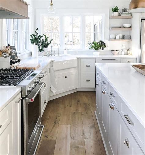 White Kitchen With Off White Cabinets White Marble Quartz Countertop