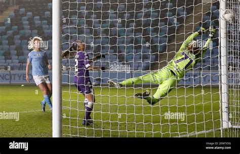 manchester city s sam mewis left scores their side s second goal of the game during the women