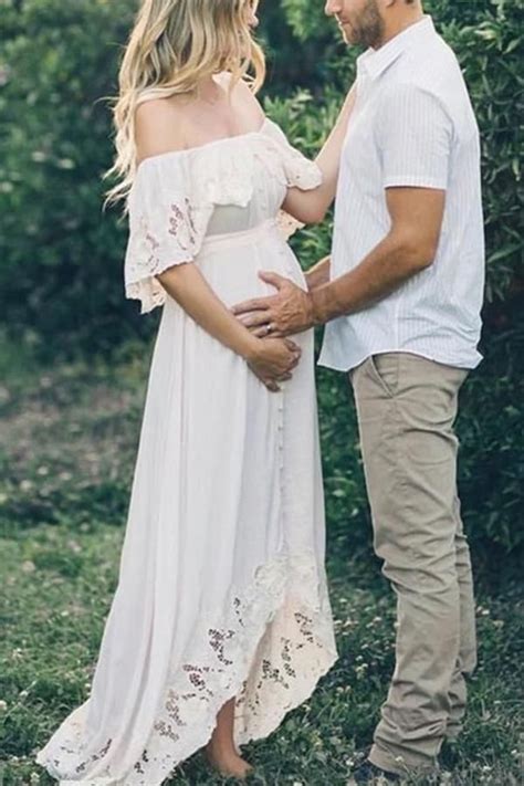 Maternity Solid White Lace Off Shoulder Dress In Photoshoot