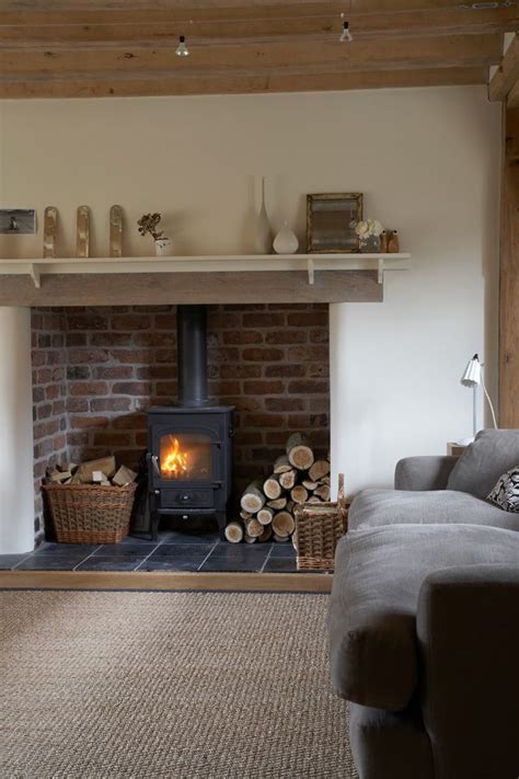 The flames are magical and are completely mesmerizing. fire place ideas | Oak frame house, Stove fireplace ...