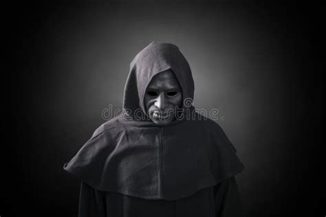Scary Figure In Hooded Cloak With Mask Stock Photo Image Of Ghost