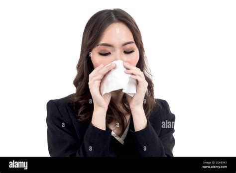 Sick Woman Blowing Her Nose With Tissues Isolated On White Background