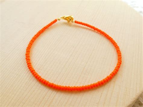 Orange Armband Samen Perle Armband Leuchtend Orange Armband Etsy