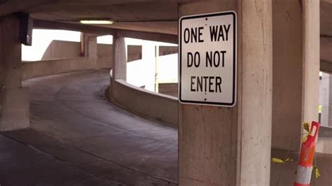 One Way Do Not Enter Sign In Parking Gar Stock Video Pond