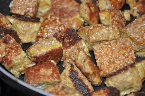 Tear bread into chunks (or cut into cubes) and evenly distribute in the pan. cookin french toast bites - Be Well With Arielle
