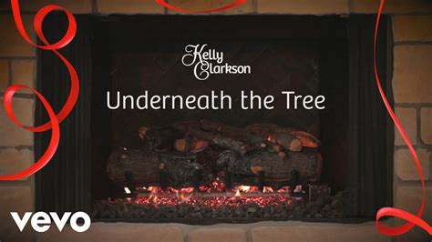 Kelly Clarkson Underneath The Tree Kelly S Wrapped In Red Yule Log Series Christmasmusic Com