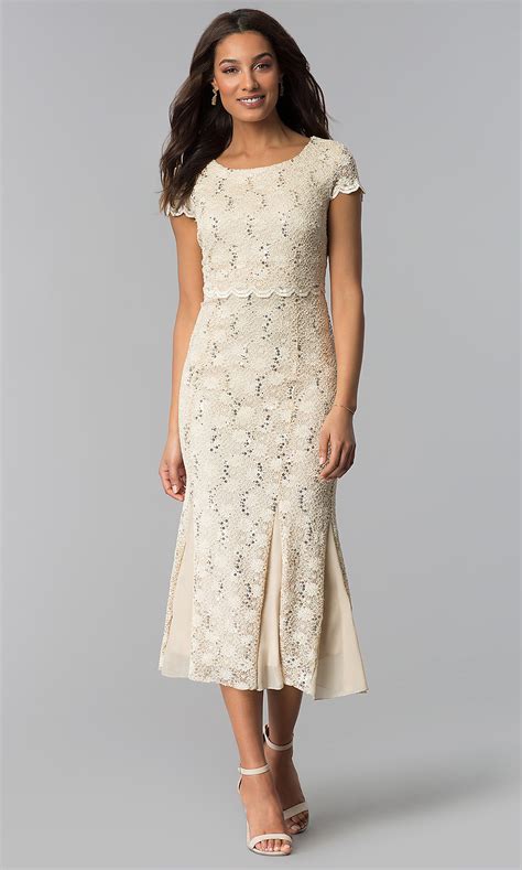 Once thought of as the staple for traditional gowns, wedding dresses with sleeves have grown to become one of the most popular options. Lace Midi Wedding-Guest Dress with Short Sleeves